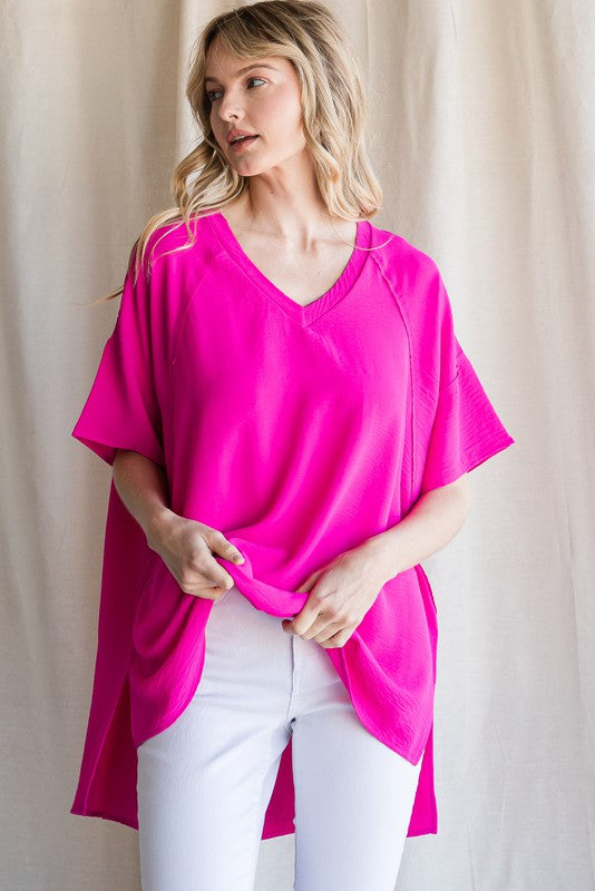 Solid V neck raw hem edge
